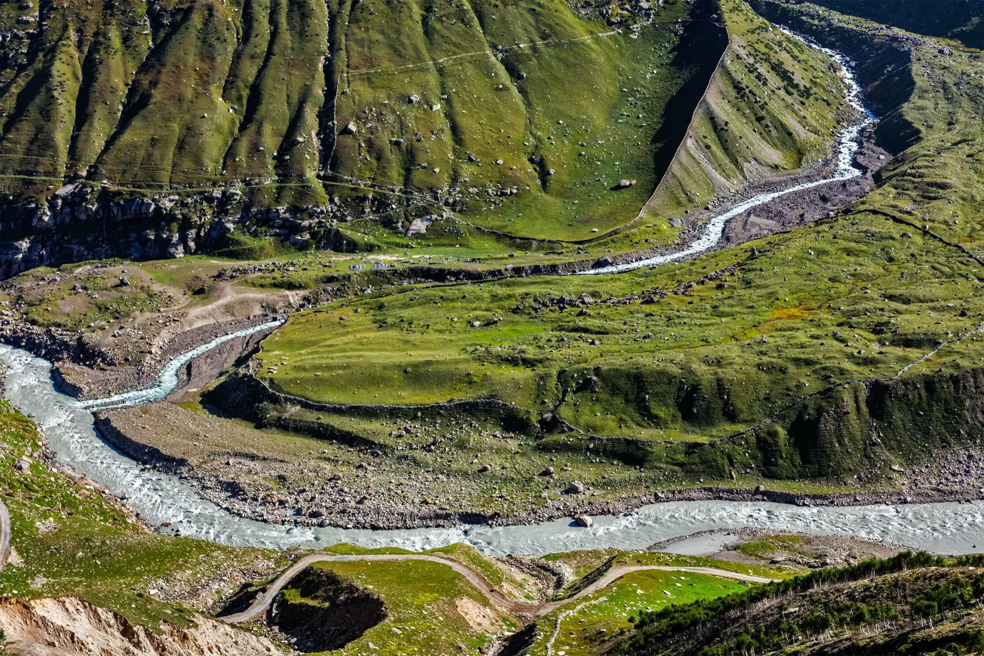 The Chandra river winding through the green floor of the Lahaul valley